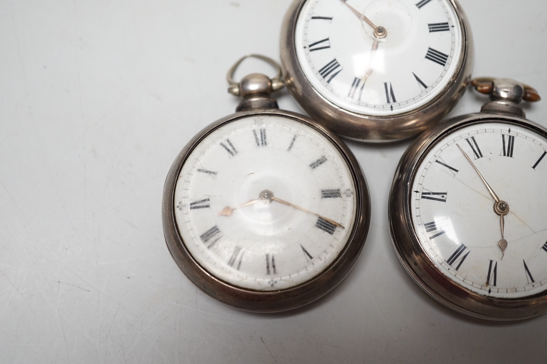 Three 19th century silver pair cased keywind verge pocket watches by Marriott of Northampton, George Bates of Kettering and Carter of Salisbury.